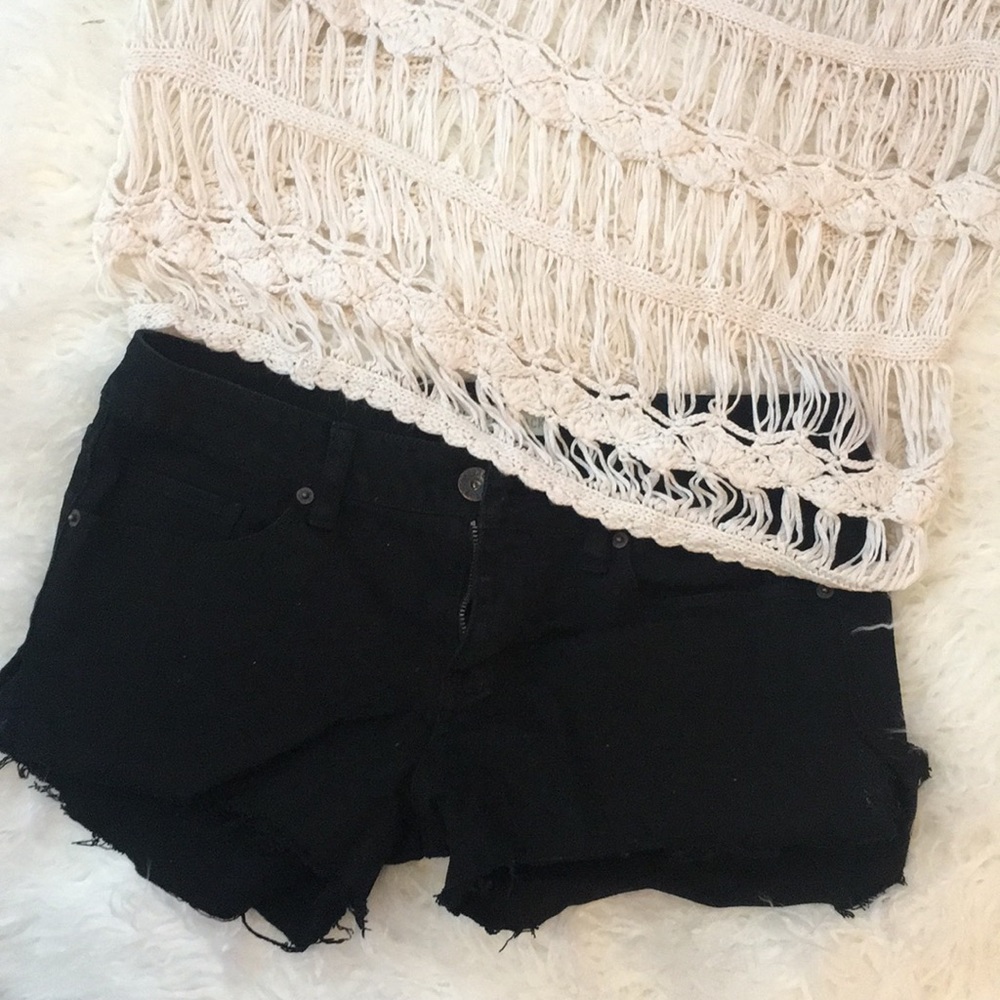 Black jean cut off shorts.